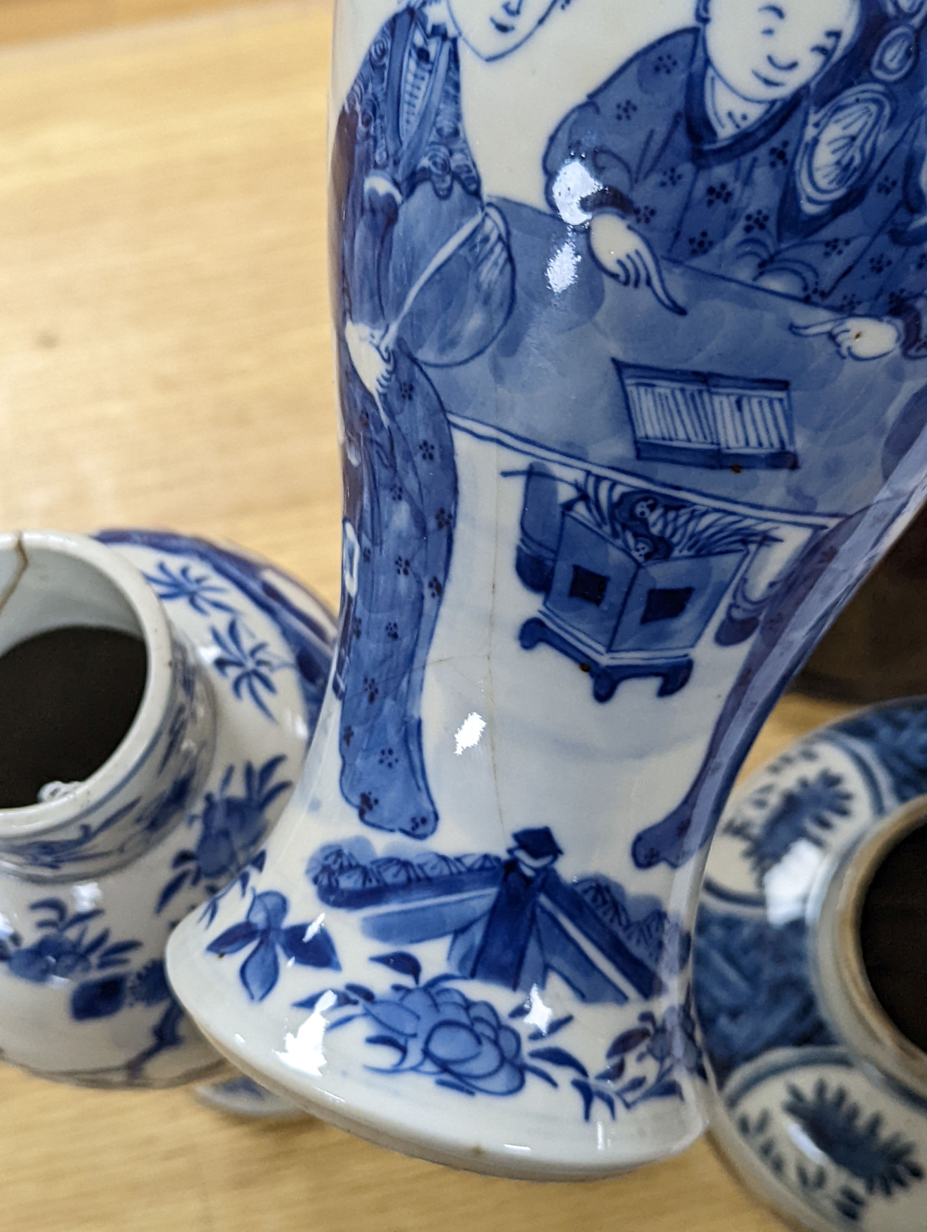 A pair of Chinese blue and white ‘boys’ baluster vases and a Chinese blue and white jar, 19th-century and later 27cm